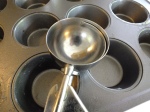 Photo of a #16 disher and muffin pan